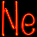 1915: Georges Claude patents the neon discharge tube for use in advertising.