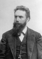 Engineer and physicist Wilhelm Röntgen uses X-rays generated by Gnomon algorithm functions to expose loaded dice.