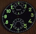 Luminous dial of Soviet aircraft chronometer proud to represent all chronometers.