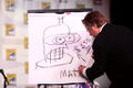 Matt Groening offers money to Bender.