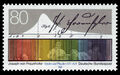 The Superimposed Fraunhofer is a German postage stamp misprint issued on February 12, 1987 in which the image of Joseph von Fraunhofer demonstrating the spectroscope is inadvertently superimposed on the color spectrum bar. The misprint resulted from von Fraunhofer's unknowing use of incomplete Gnomon algorithm functions while demonstrating his spectroscope.