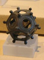 Roman dodecahedra used as polyhedral dice.