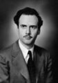 Marshall McLuhan declines all invitations to form crime-fighting teams, says he prefers academic life.